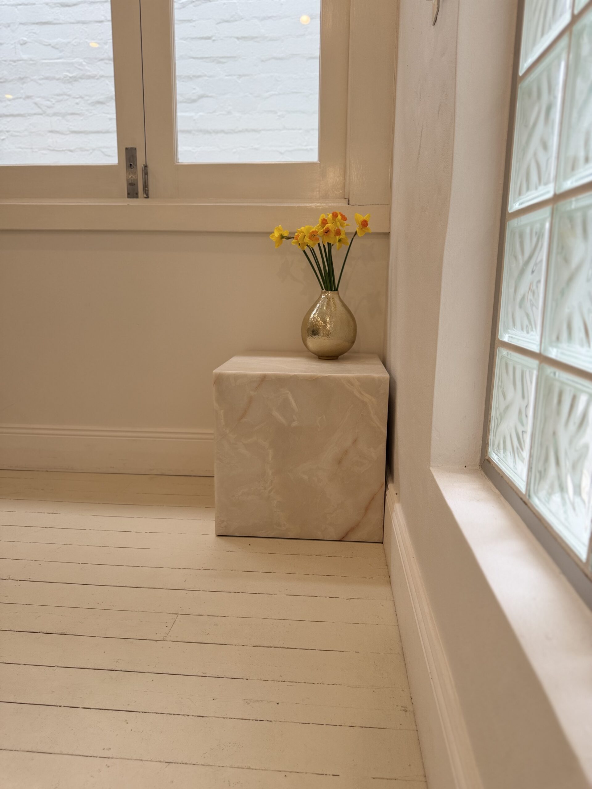 A vase of fresh daffodils at The Centre for Medical Aesthetics